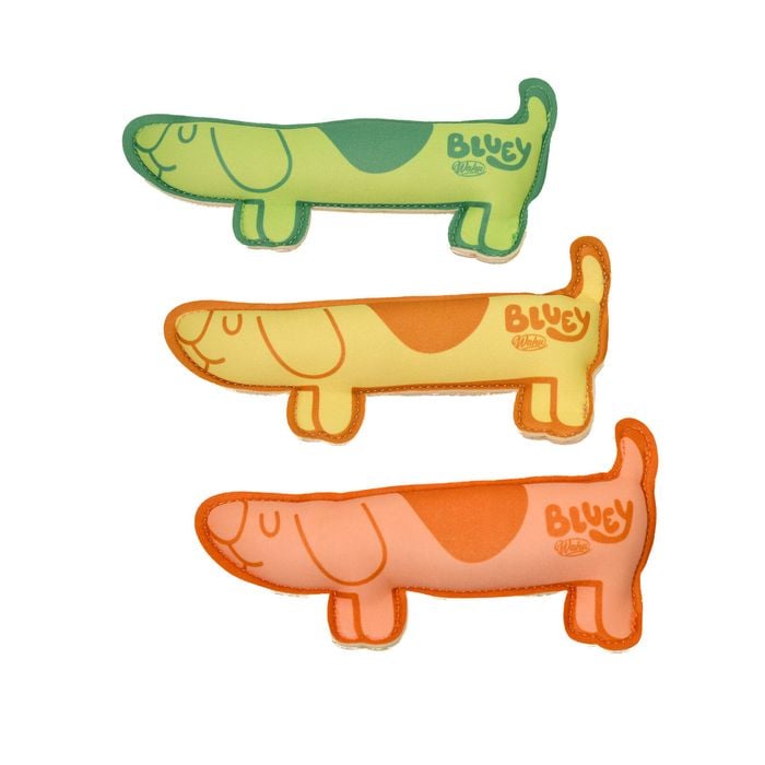 Three colorful dog toys shaped like dogs on a white background at Pet Servo