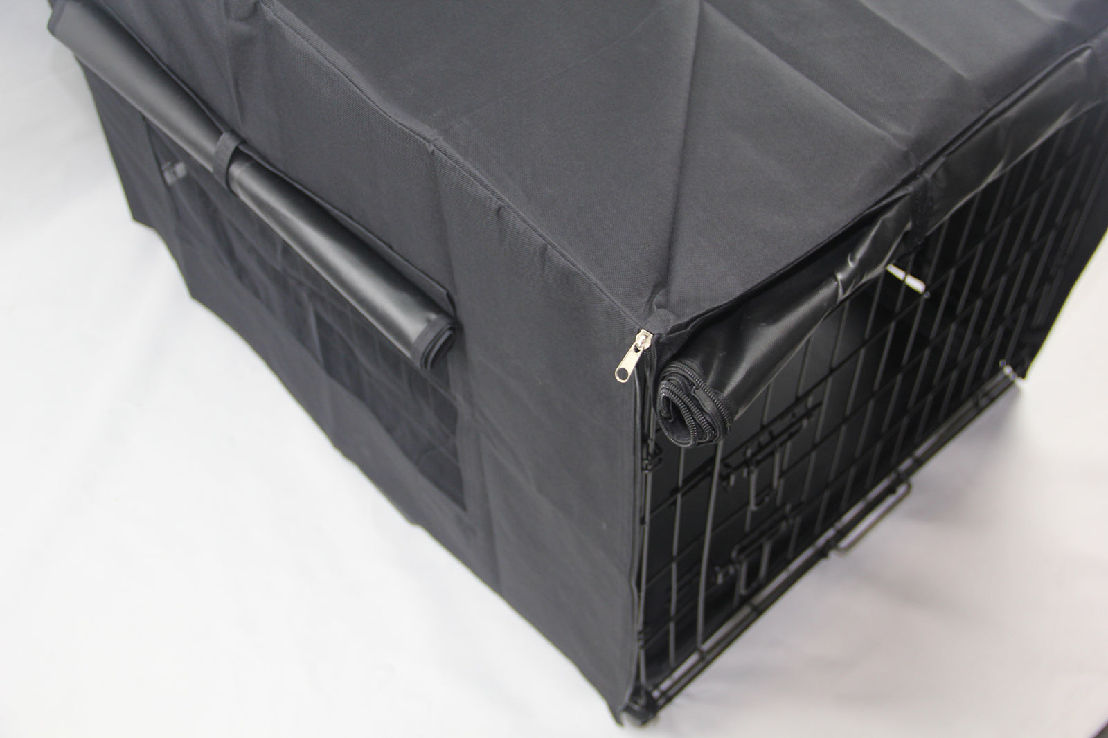 Black pet crate with cover on a white background at Pet Servo