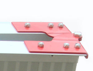 Metallic object with a red component and screws on a white background at Pet Servo