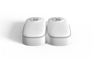 Two white salt and pepper shakers on a white background at Pet Servo