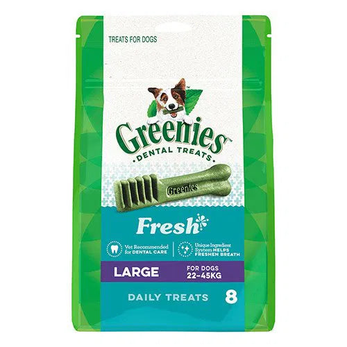 Greenies dental treats packaging for dogs on a white background