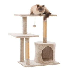 Cat tree with a cat perched on top against a white background