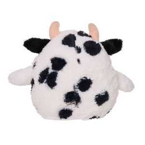 Plush toy shaped like a cow on a white background