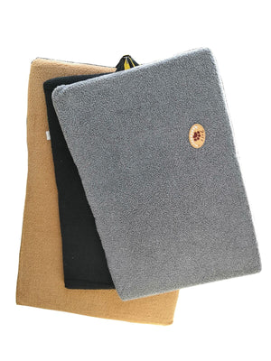 Three textured fabric covers in gray, black, and beige on a white background at Pet Servo