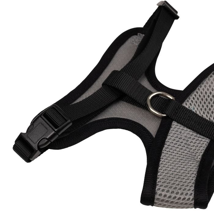 Black and gray dog harness on a white background
