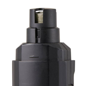 Close-up of a black cylindrical object with a textured top on a white background