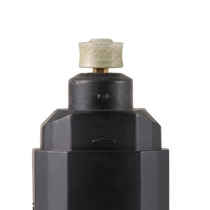 Black metal fitting with a textured cap on a white background