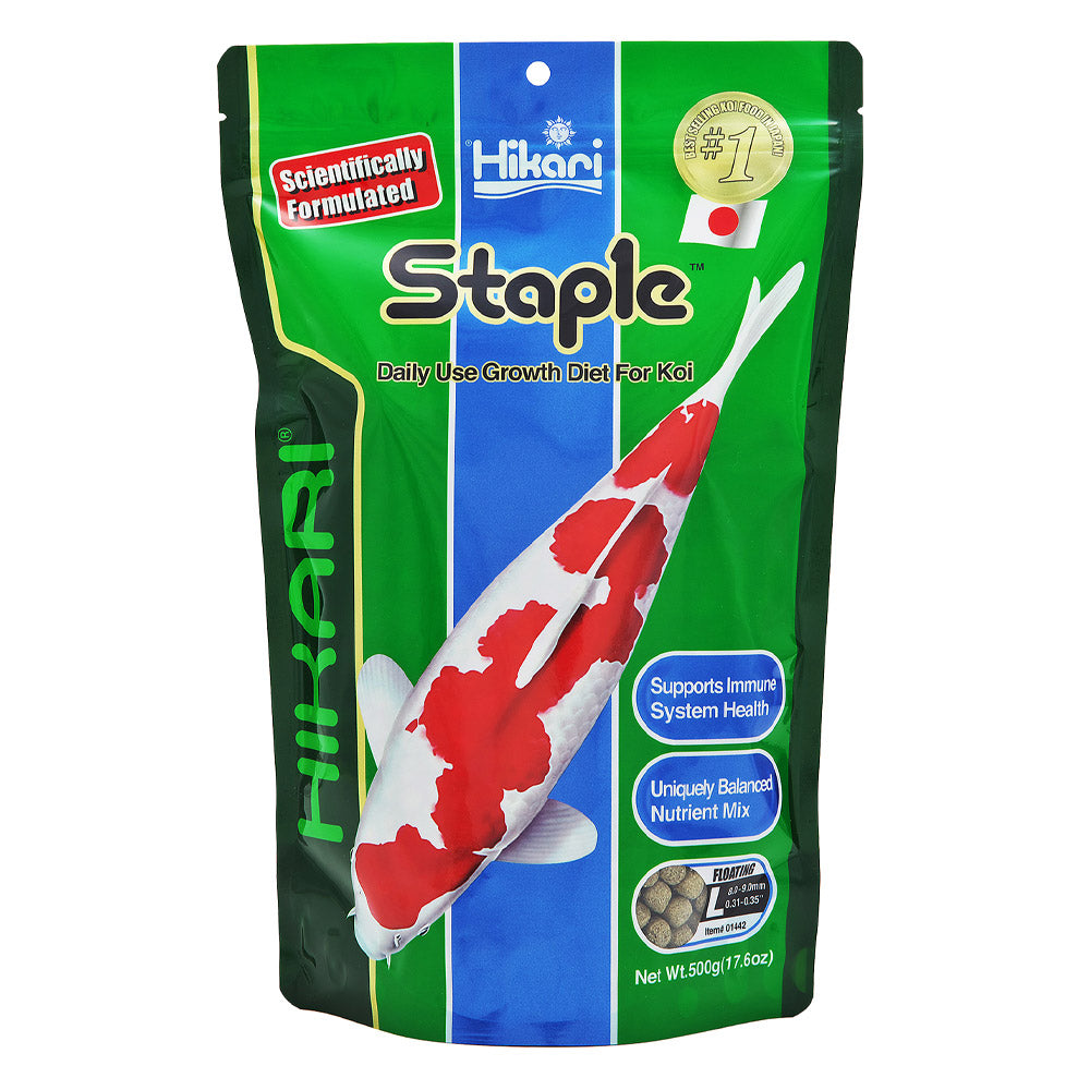 Hikari Staple Koi fish food packaging with a koi fish illustration on a green and blue background at Pet Servo