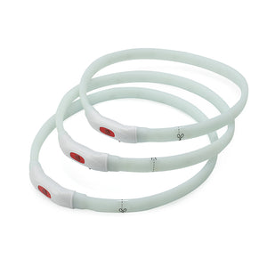 Coiled white LED strip light with red connectors on a white background at Pet Servo
