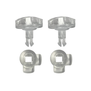 Four clear plastic clips on a white background