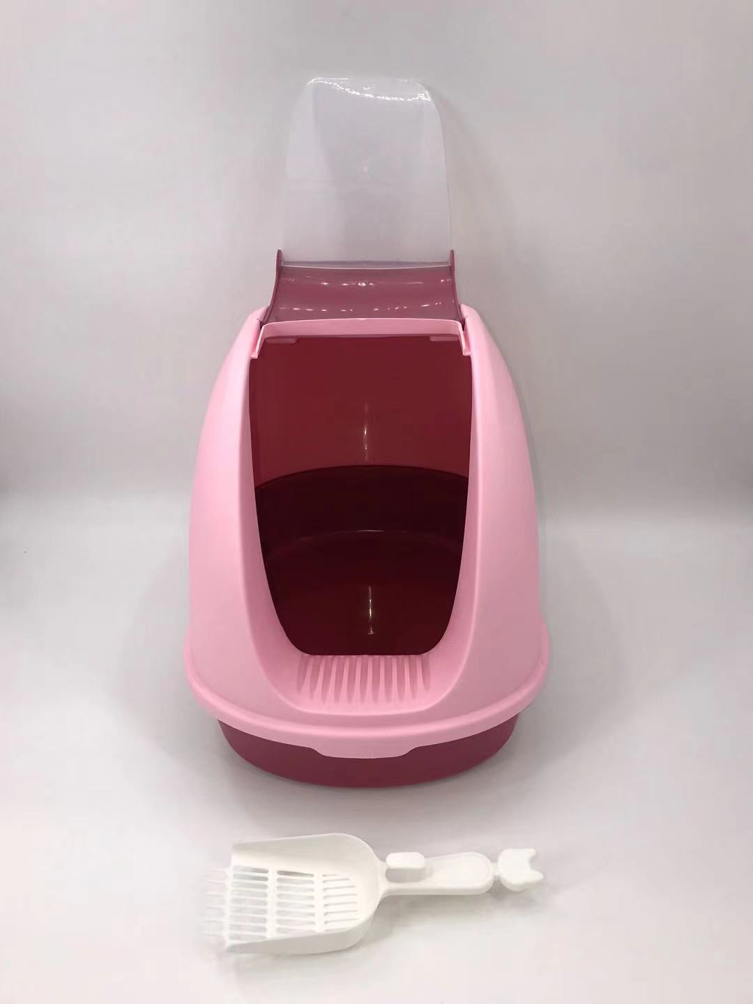 Pink and red pet litter box with a scoop on a white background at Pet Servo