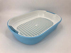 Blue and white pet litter pan on a light gray background at Pet Servo