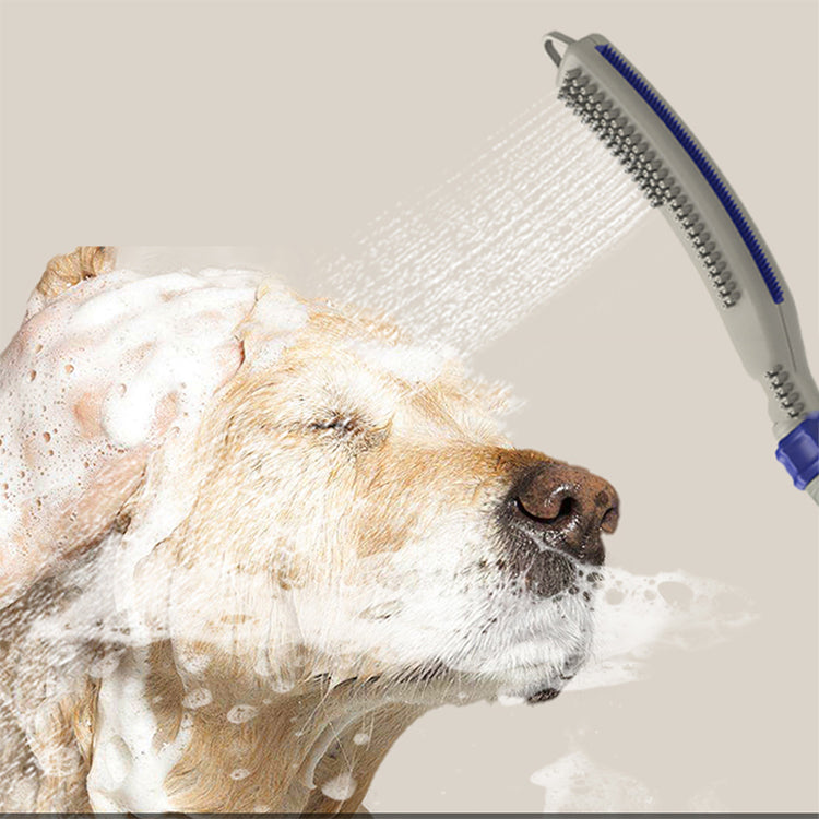Dog being washed with a shower head on a light background at Pet Servo