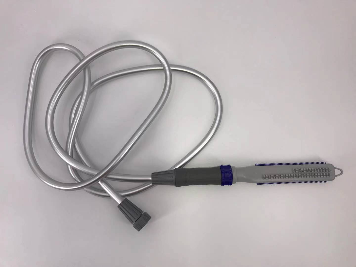 Coiled cable with a plug on a light gray background at Pet Servo