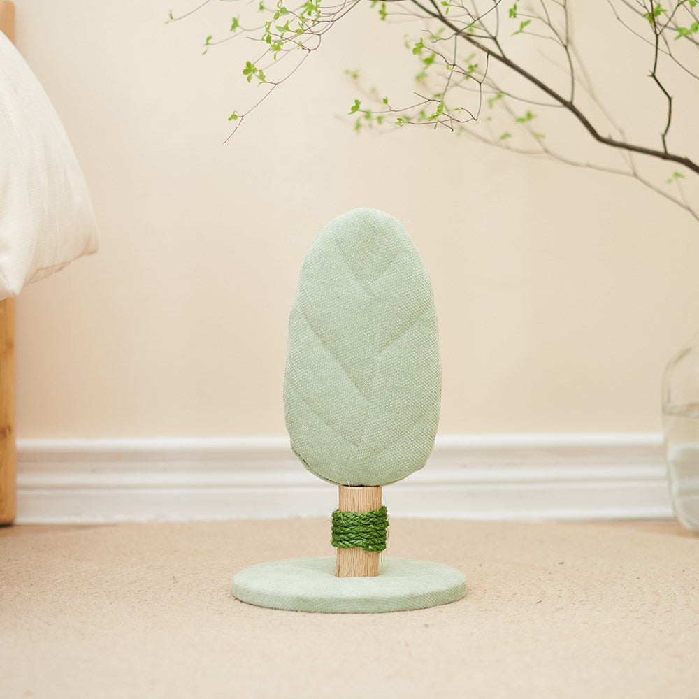 Decorative leaf-shaped object on a stand with a neutral background at Pet Servo