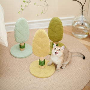 Cat sitting on a colorful cat tree with a neutral background at Pet Servo