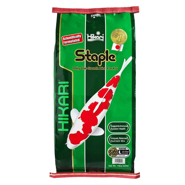 Hikari Staple fish food packaging with a red and white koi fish on a green background at Pet Servo