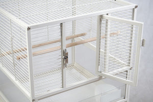 White bird cage with open door on a light gray background at Pet Servo