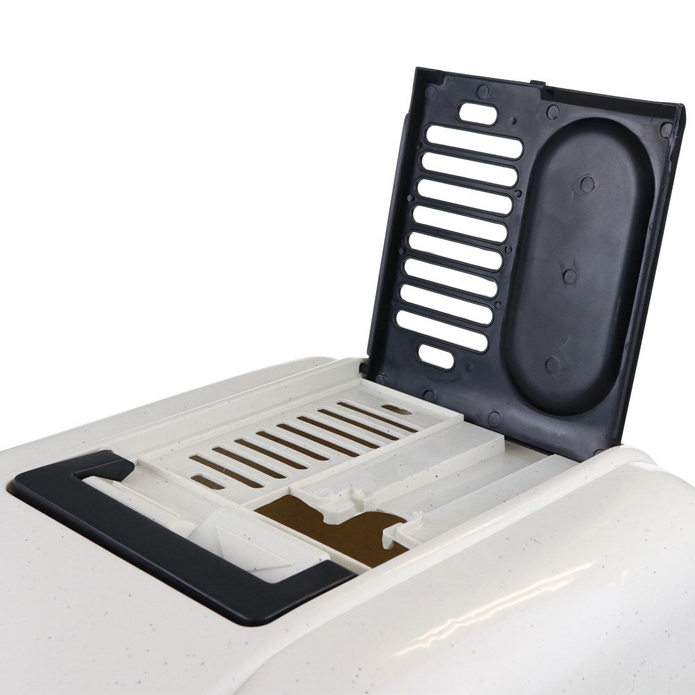Close-up of a white appliance with black grates on a white background at Pet Servo