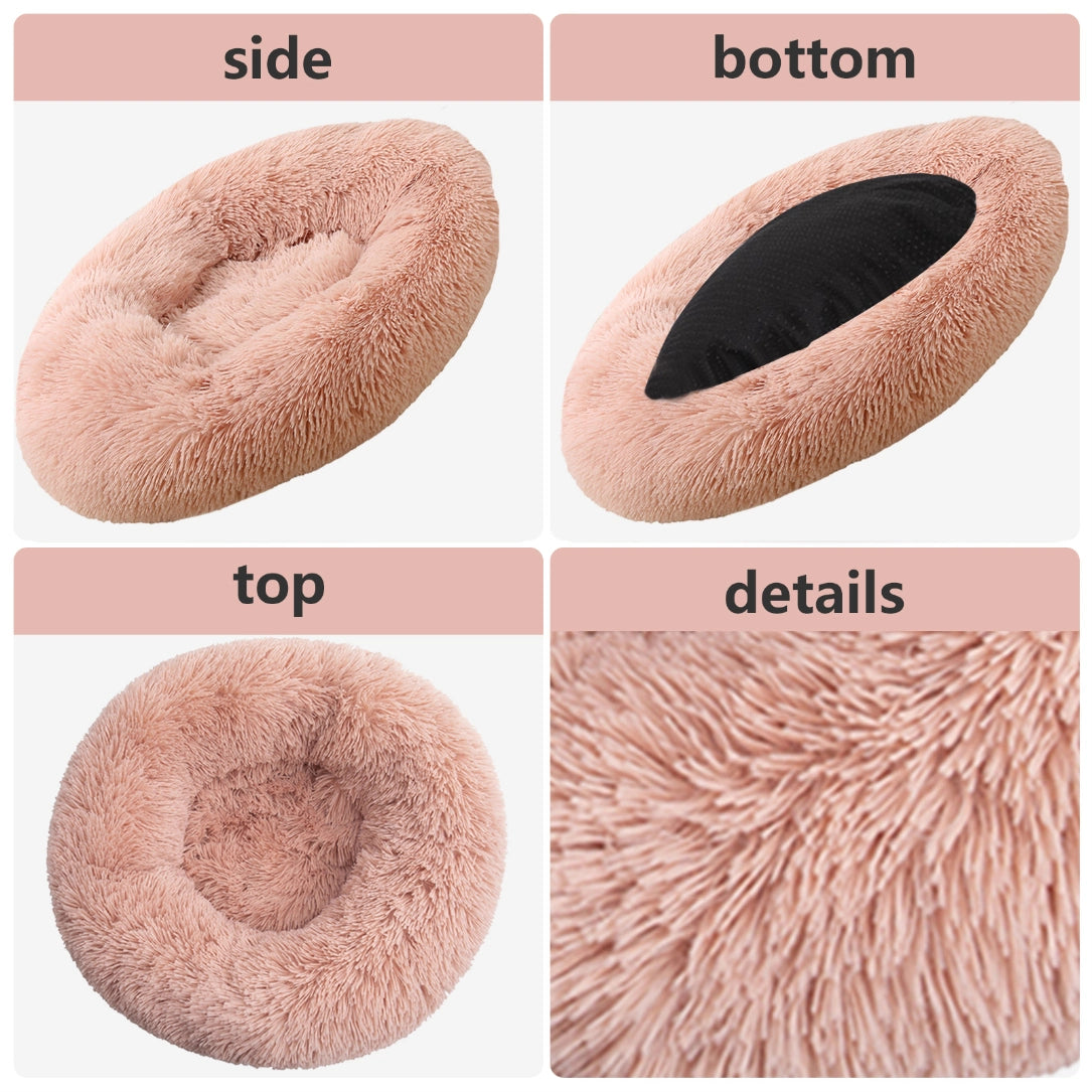Four-panel product detail collage showing a fluffy donut-shaped pet bed from the side, bottom, top, and close-up details. The bed is light blush pink with a black interior lining visible in the bottom view at Pet Servo
