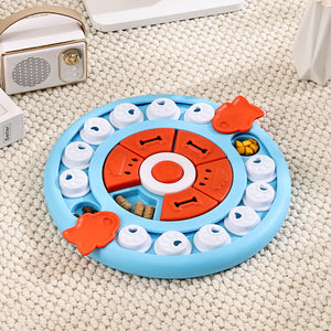 Round pet toy with blue, orange, and white colors on a beige carpet at Pet Servo 
