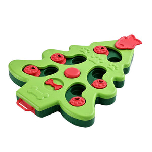 Green Christmas tree-shaped puzzle toy with red pieces on a white background at Pet Servo
