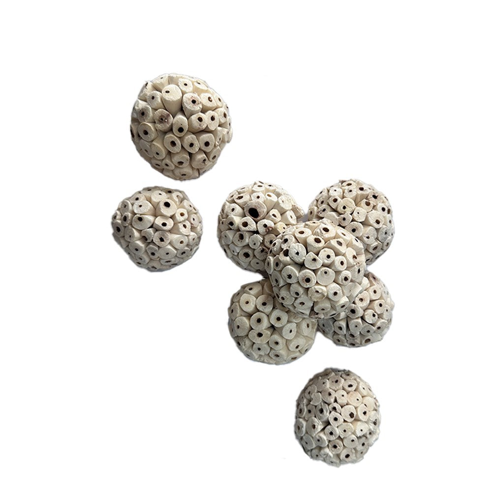 Five small spherical beads with a textured, perforated surface, shown on a plain white background at Pet Servo
