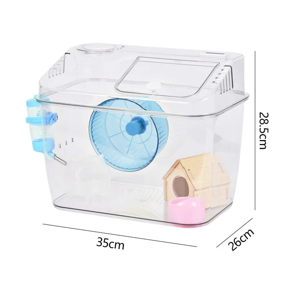 Clear hamster cage with blue wheel, wooden house, and pink platform, dimensions shown.