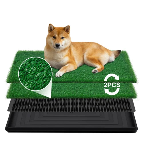 Two green artificial grass mats with black drainage trays underneath, shown on a white background with a Shiba Inu dog lying on the top mat and a circular inset showing the grass texture at Pet Servo