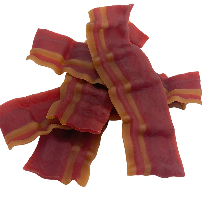 Red and orange striped candy on a white background