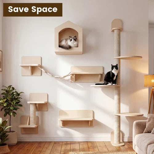A wall-mounted cat tree and shelf set in a warm beige tone, shown installed in a living room with two cats resting on different levels. The set includes a house-shaped cat bed, multiple platforms, a tall scratching post, and a climbing ladder at Pet Servo