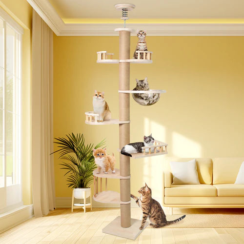 Cat tree with multiple levels in a room with yellow walls and a couch at Pet Servo