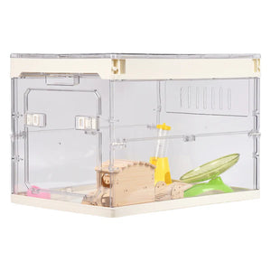 Clear acrylic pet cage with wooden and plastic toys on a white background