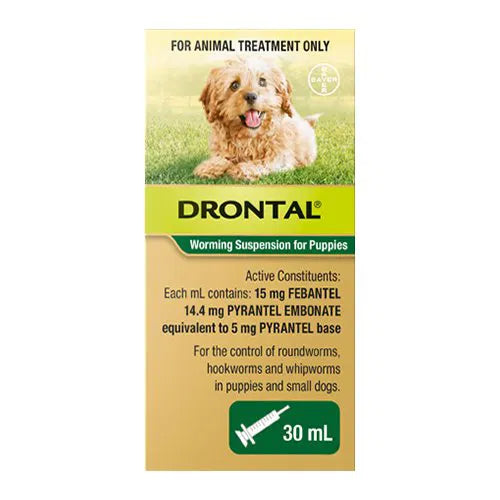 Drontal worming suspension for puppies packaging with a dog on a grass background